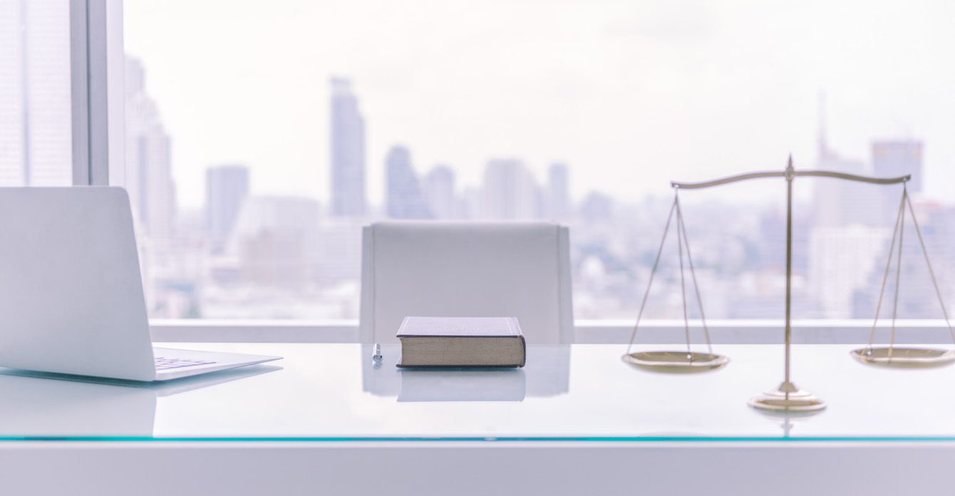 Law Books Computer Scales Justice On Desk