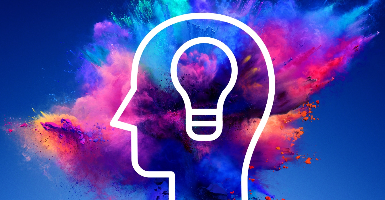 Head icon with lightbulb and color explosion behind