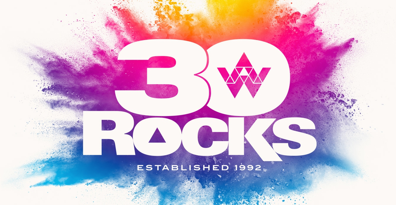 AW 30th anniversary logo over explosion of color.