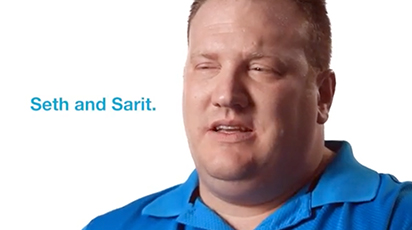 A person in a blue shirt is shown against a white background. The text 